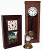 Clocks- 3 (Three): (1) German, 400-day or rotary pendulum mantel clock. (2) Boardman & Wells, Bristol, Conn., 30 hours, time, strike and alarm, weight wood movement bevel case shelf clock, c1845. (3) European (German?), electric wall regulator. Dial marked "NT".