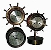 Clocks- 3 (Three) brass case, 8 days, hinged bezel marine clocks: Seth Thomas time only; Waterbury time and ship's bells yacht wheel on purpose-made stand; Salem, 8 days, time and ship's bells yacht wheel; 20th century