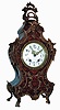Lenzkirch, Germany, shelf clock in the Neuchatel style, burl walnut veneered case, heavily ornamented with gilt, cast brass mounts in the French style, gilt bezel with similar decoration, Arabic numeral white enamel dial with polychrome enamel floral festoons, fancy gilt hands, 8 days, time and strike movement, serial #133811, c1890