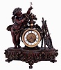 France, conical "mysterious" clock, the patinated spelter case with fluted base and rounded ends, the front festooned with roses and supporting the central clock case, with flanking draped putto, his outstretched arm supporting the gilt conical pendulum, opposite a portrait, easel, and laurel wreath, skeletonized Roman numeral, signed white enamel dial, blued steel Breguet style hands, brass, 8 days, time and strike movement, c1880