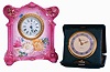 Clocks- 2 (Two): An Ansonia Royal Bonn desk or bedside clock, pink case with floral decoration, 30 hours timepiece movement, and a Waltham folding travel clock, painted metal dial with fancy gilt hands, 8 days timepiece movement, both c1900