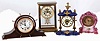 Clocks- 4 (Four): (1) Waterbury Clock Co., "Granville" crystal regulator, c1913; (2) Seth Thomas wood mantel, c1935; (3) William L. Gilbert "Hub", 30 hours, backwind porcelain; (4) Junghans, 30 hours, porcelain timepiece, c1910.