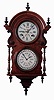 Welch, Spring, & Co., Bristol, Conn., "Hanging Wagner", wall clock, 8 days, time and B.B. Lewis calendar, spring driven movement in a walnut case with a painted metal dial, c1878.