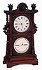 Seth Thomas Clock Co., Thomaston, Conn., "Parlor Calendar, No. 9", in walnut with burled and carved accents, 8 days, time and gong strike, c1885