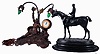 Clocks- 2 (Two): (1) William L. Gilbert Clock Co., "Curfew", painted wood, 8 days, time and strike mantel clock, c1913; (2) Cast spelter, 30 hours, backwind clock, with electrolier plus an equestrian statue on wood base, early 20th century