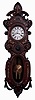 German, 2-weight "Vienna" style wall clock, in an unusual alt Deutsch case with carvings and brass appliquEs., serial #293731, c1875, with restorations.