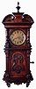Lenzkirch, Germany, Symphonion, Musical Clock, style 25R, playing 30 cm disc, on the hour or at will, with sublime harmony double comb set, in a walnut wall case with turned drops, The time movements for these musical clocks were special ordered from Lenzkirch, with an added lever that rises and falls on the hour to actuate the music. Lenz serial # 927195, c1895