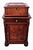 Polyphon, Leipzig, Germany 15 1/2" disc player in hardwood case, with associated larger cabinet with six drawers containing many additional discs, c1900