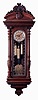 Vienna Regulator, Grande Sonnerie wall clock, 8 days, three weight driven movement in an Alt Deutsche style carved walnut case with engraved dial center, pendulum bob and brass weights, c1875