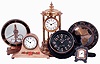Clocks- 6 (Six): German with electromagnetic pendulum; New Haven, 30 hours floral small tambour; Cyma Swiss, for Gorham, Silver, 30 hours desk clock; round with Africa map surrounded by Zodiac signs; Chelsea, 8 days, phenolic U.S. Navy Mark 1 deck clock 1942; German "Louvre" 400 day; 20th century