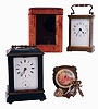 Clocks- 3 (Three): Two French carriage clocks, the first by Rollin a Paris, ebonized wood case with brass stringing and moldings, beveled glass at top and front, Roman numeral white enamel dial, 8 days time and alarm movement with lever platform, mid 19th century, the other marked "Duverdrey & Bloquel", with gilt brass case, Arabic numeral white enamel dial, 8 days timepiece movement with cylinder platform, with outer case, c1900, together with a Swiss, 8 days chatelaine clock with lever escapement, c1900