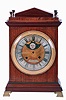 European bracket clock, mahogany and mahogany veneer oak case in the Regency style, gilt brass bracket feet, brass stringing and molding, engine turned gilt bezel with Roman numeral silvered dial, the matted, gilt center with silvered plaque signed "Jan Van Dijk Amsterdam", and also with painted moon phase disc, 15 day rectangular brass, time and strike movement with verge escapement, five turned baluster pillars, pierced steel warning and locking levers, movement early 18th century, case early 19th century