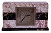 ATO, France, mantel clock, rectilinear Art Deco case constructed of Rosa Norvegia and Portoro marbles, square, Arabic numeral metal dial, steel hands, brass movement marked in part "Leon Hatot Fabricants Paris", c1930