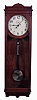 Large American Jeweler's Regulator wall clock, 8 days, time only, weight driven with a Seth Thomas No. 62 movement with a meter long pendulum in a cherry case with nickel bob, weight and clamshell pulley and painted metal dial, c1900