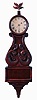 Boston area lyre clock, mahogany and mahogany veneer case with turned wooden bezel, leaf and scroll carved throat panel, bull nose molded lower door and with veneered bracket, carved leaf form finial, Roman numeral white painted sheet iron dial, 8 days, weight driven brass timepiece movement, c1830