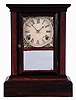 Atkins Clock Co., Bristol, Conn. Cottage mantel clock in a rosewood veneered case with a spring driven, 8 days, time and strike movement, c1870.