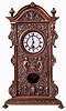 Gustav Becker, Germany, desk or table clock, the cast brass front ornamented in the Adamesque style, also with half caryatids, and arched top with satyr mask, the back of the top marked "Sim. K. Noch 13888", all mounted to an ebonized wooden case, with Roman numeral white enamel dial, black steel hands, 8 days timepiece movement, the back plate with Becker logo, R/A pendulum suspended from the top of the movement mounting bracket, c1890