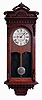 Seth Thomas Clock Co., Thomaston, Conn., special order wall clock. 8 day, time and strike, spring driven movement in a walnut case with carved and turned elements with a painted metal dial, c1880