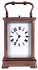 France, carriage clock, Corniche variant gilt brass case with five beveled glass panels, Roman numeral white enamel dial with blued steel spade hands, 8 days, time and strike movement with lever platform, announcing the hours and half hour on a coiled gong, and repeating the last hour on demand, c1900