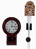 Clocks- 2 (Two): Anglo- American wall clock, mahogany veneered drop dial case, Roman numeral white painted dial, 8 day time and strike movement, and a Black Forest shield dial clock, Roman numeral painted dial, thirty hour weight driven movement with wooden plates, iron weights, both late 19th century
