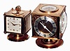 Clocks- 2 (Two): brass with weather stations, swiveling multidial instruments with 8 day timepieces, hygrometer, barometer, thermometer: Kirby, Paris, with top compass; Imhof Swiss; mid 20th century