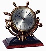 Chelsea Clock Co., Boston, Mass., "Comet", brass on mahogany base, 8 days, time only swivel head yacht wheel desk clock, c1948