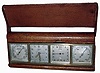 Angelus, Swiss-made four dial weather station in brass, leather and clear acrylic case, 8 days movement with alarm, calendar, barometer and Celsius thermometer, c1955