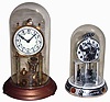 Clocks- 3 (Three) anniversary clocks: Chinese modern "Elvis" battery-driven; German 4-ball 400 day made by Schatz for John Wanamaker, Philadelphia; Kundo German 400 day; 20th century