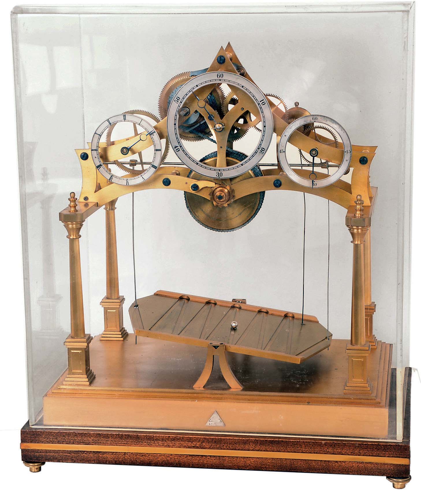 Congreve-style rolling ball clock, modern reproduction with "Dent" plate on the front, brass on wood base with Plexiglas cover, c2000 — Antique Clocks Price Guide