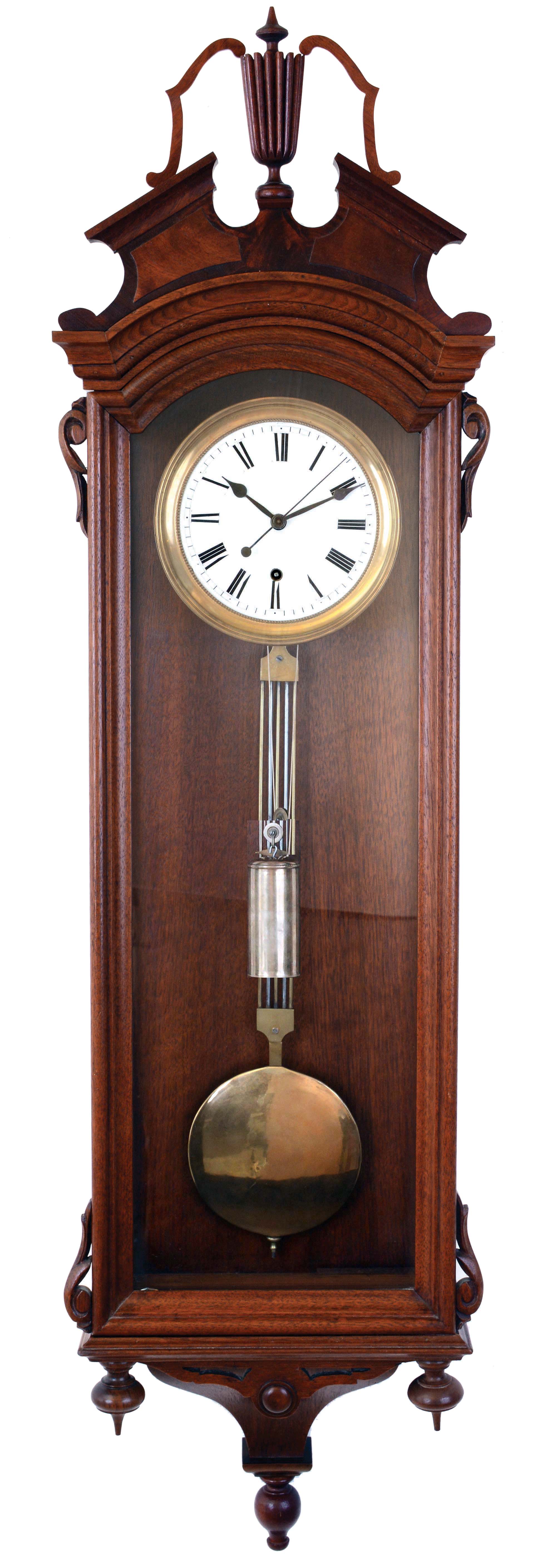 George A. Jones &amp; Co., New York, hanging regulator, 8 days, time only weight driven movement with sweep center seconds in a walnut, Vienna-style regulator case with Roman numeral white enamel dial, gridiron pendulum with brass ball, c1875. — Antique Clocks Price Guide