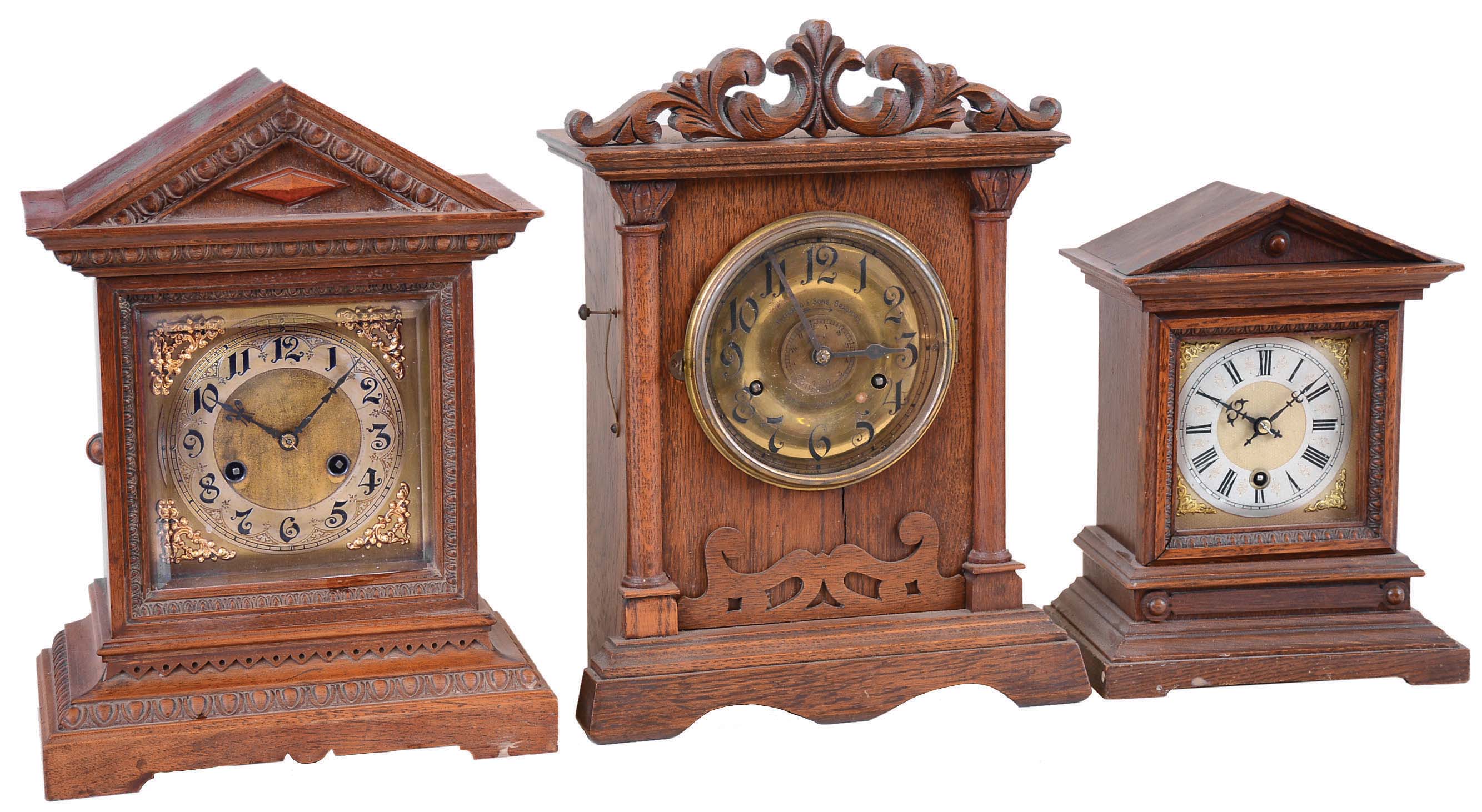 Clocks- 3 (Three) 8 day hardwood case mantel clocks: Two German (one timepiece, one striking): by Junghans; One English time, strike &amp; alarm by Fattarini &amp; Sons, time, strike and alarm; early 20th century — Antique Clocks Price Guide
