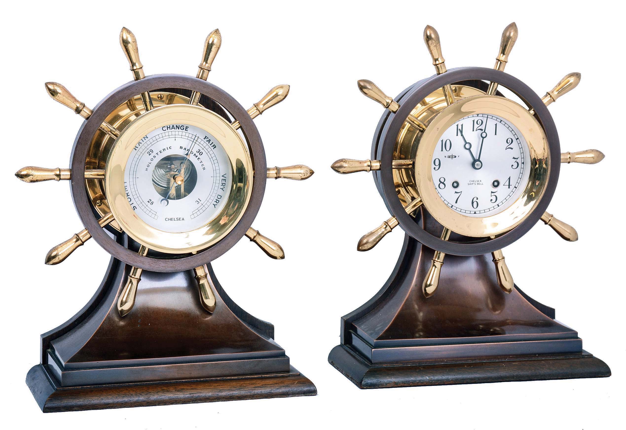 Chelsea Clock Co., Boston, Mass., "Mariner" 8 day 3 3/4"-dial time and ship's bells Yacht Wheel bronze marine clock on mahogany stand, #771357, 1976 presentation, with matching barometer — Antique Clocks Price Guide