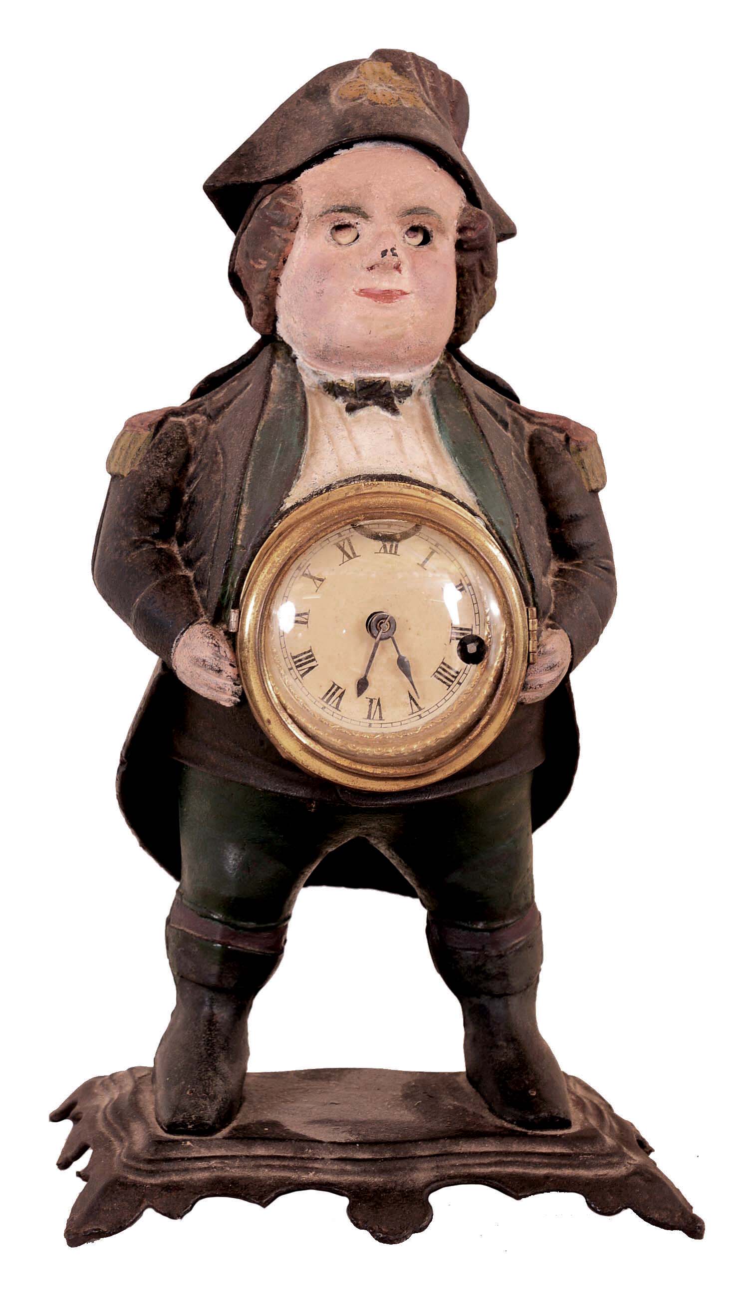 Unsigned (these were sold by the American Clock Co., Waterbury Clock Co. and others) "Continental" blinking eye cast iron clock with a cast iron case cast by Bradley &amp; Hubbard, Meriden, Conn., 30 hour lever timepiece movement. — Antique Clocks Price Guide