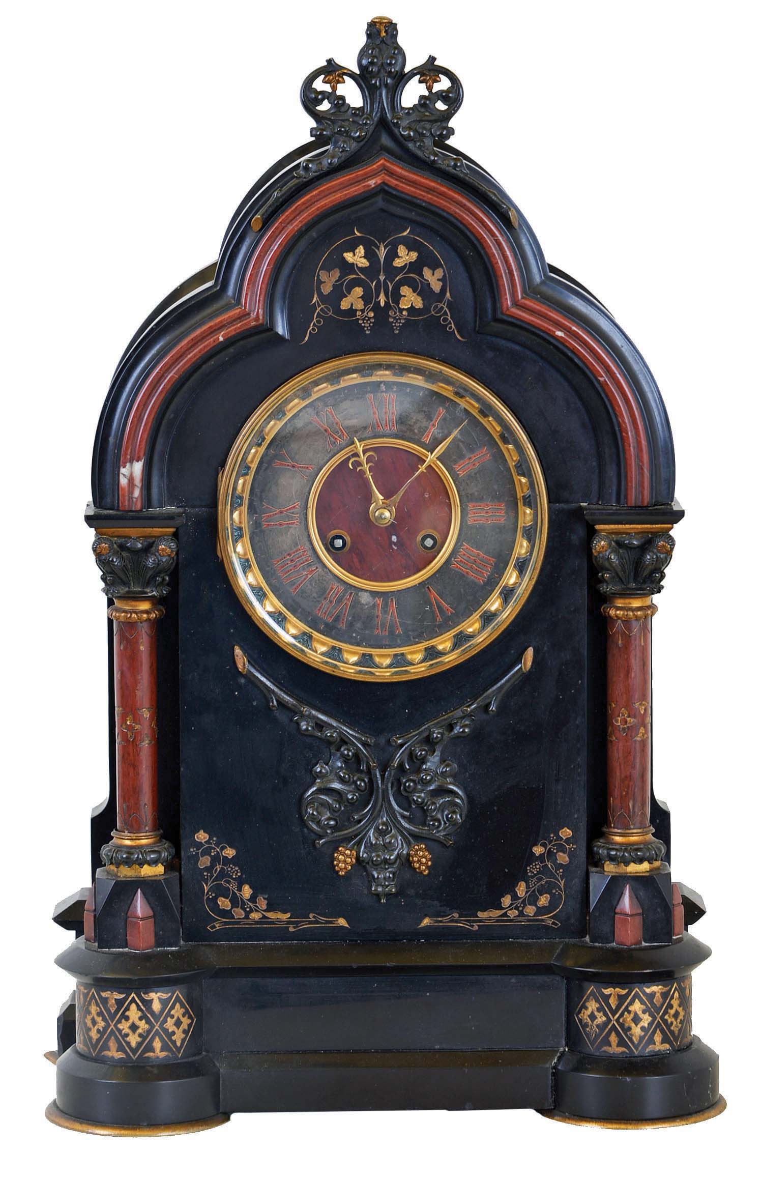 French, black marble &amp; bronze mantel clock, with red marble columns and red trim moldings, and with incised gilt accents, and with 8 day gong strike movement. — Antique Clocks Price Guide