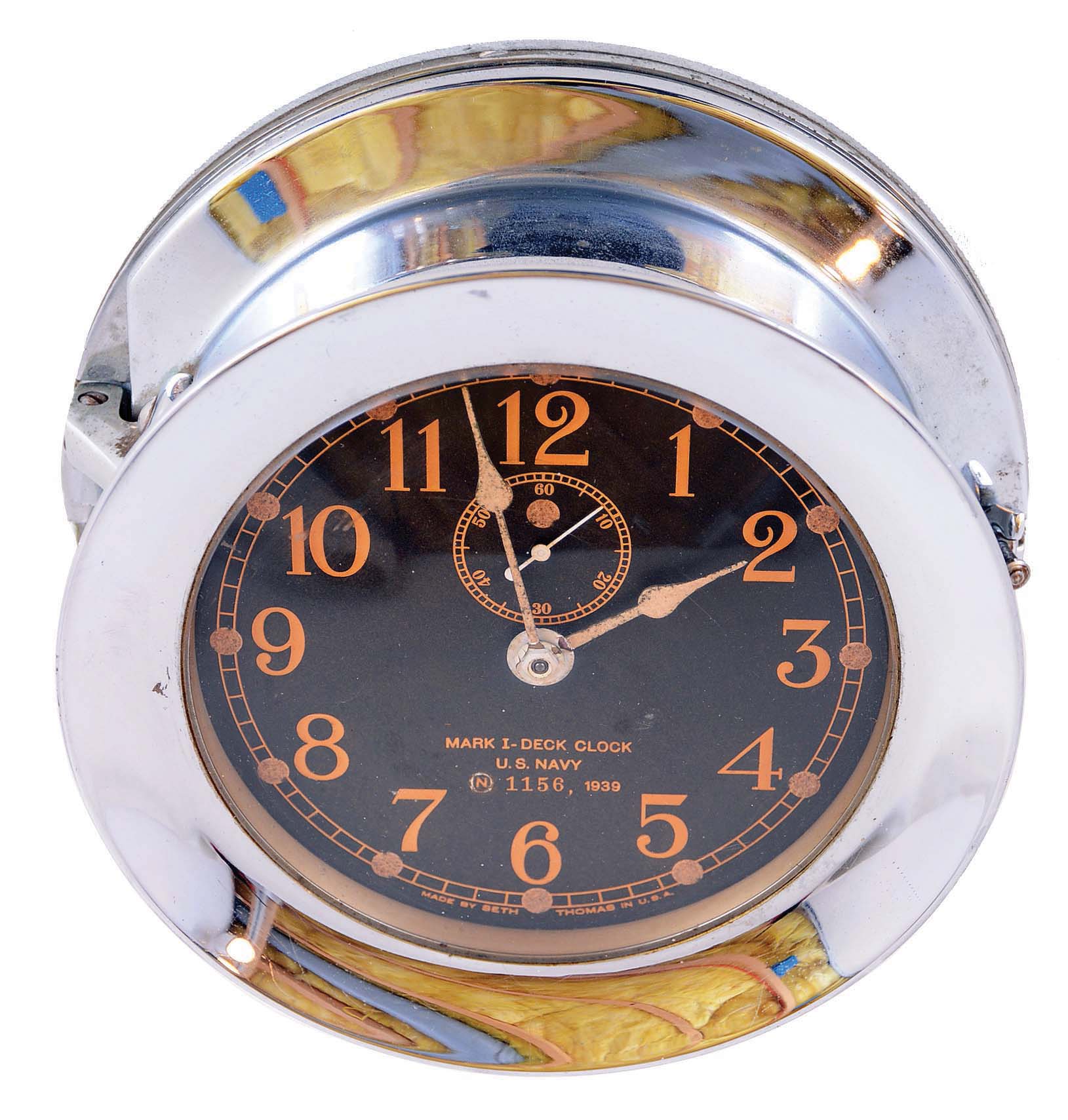 Seth Thomas Clock Co., Thomaston, Conn., "Mark 1" Deck Clock, U.S. Navy 1156, heavy hinged nickel-plated brass case, black 5" dial dated 1939, 8 day time only jeweled movement. — Antique Clocks Price Guide