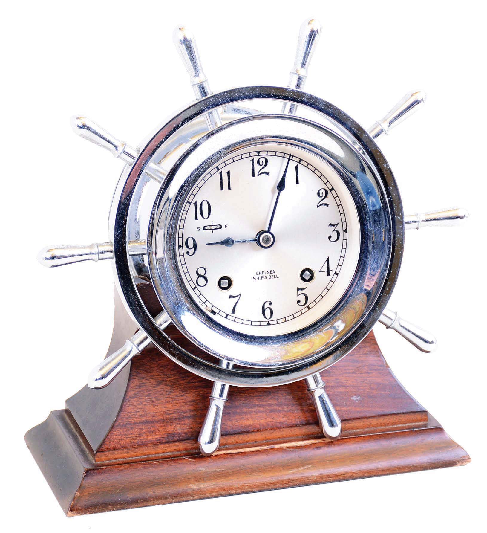 Chelsea Clock Co., Boston, Mass., Mass. "Yacht Wheel" chrome plated 8 day time and ship's bell 4" dial, screw bezel, on mahogany cradle, #649738, c1960 — Antique Clocks Price Guide