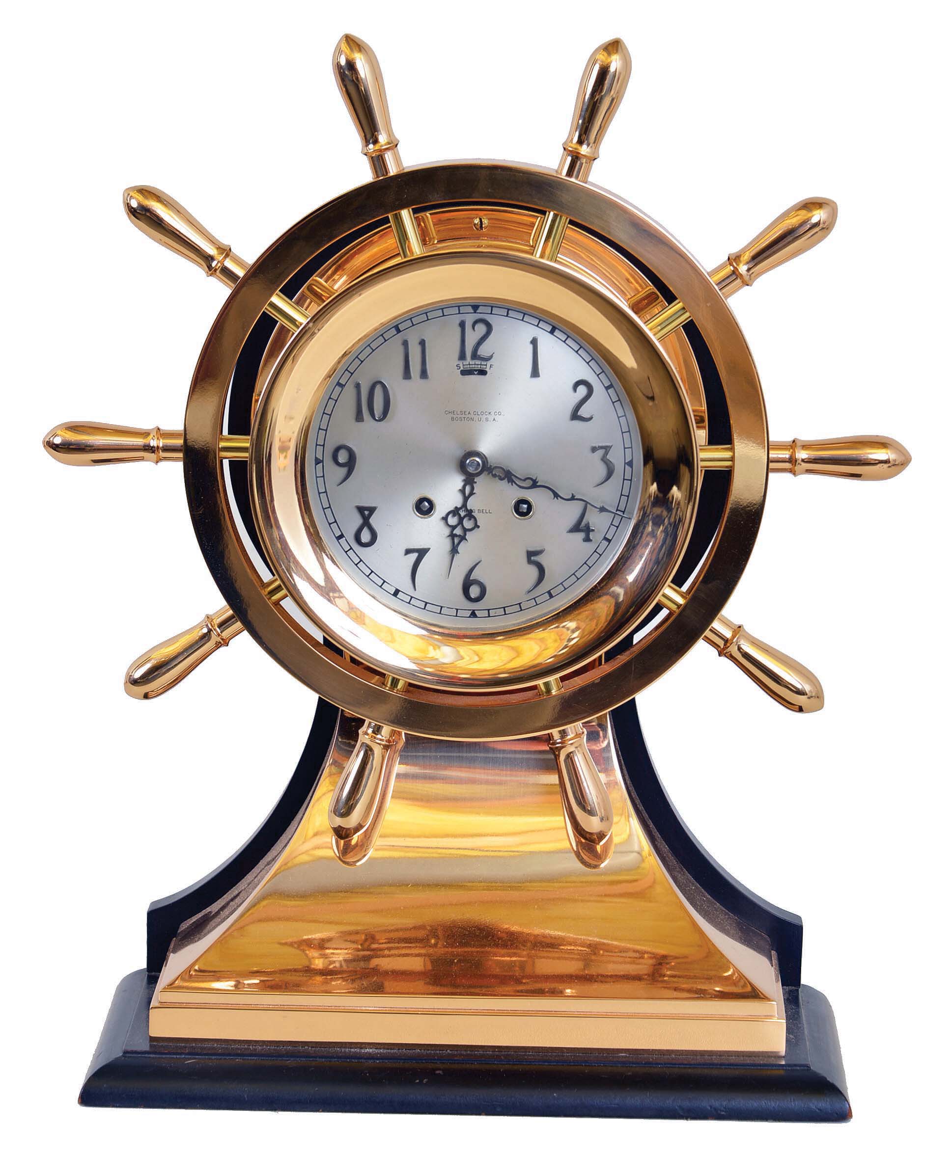 Chelsea Clock Co., Boston, Mass., "Yacht Wheel", 8 days, brass spring lever movement ship's clock. Serial No. 158448. These clocks were offered in Time Only or Ship's Bell when production began in 1906. The clock was Yacht Wheel with the base was named the Mariner. Without the base it was name the "Pilot". — Antique Clocks Price Guide