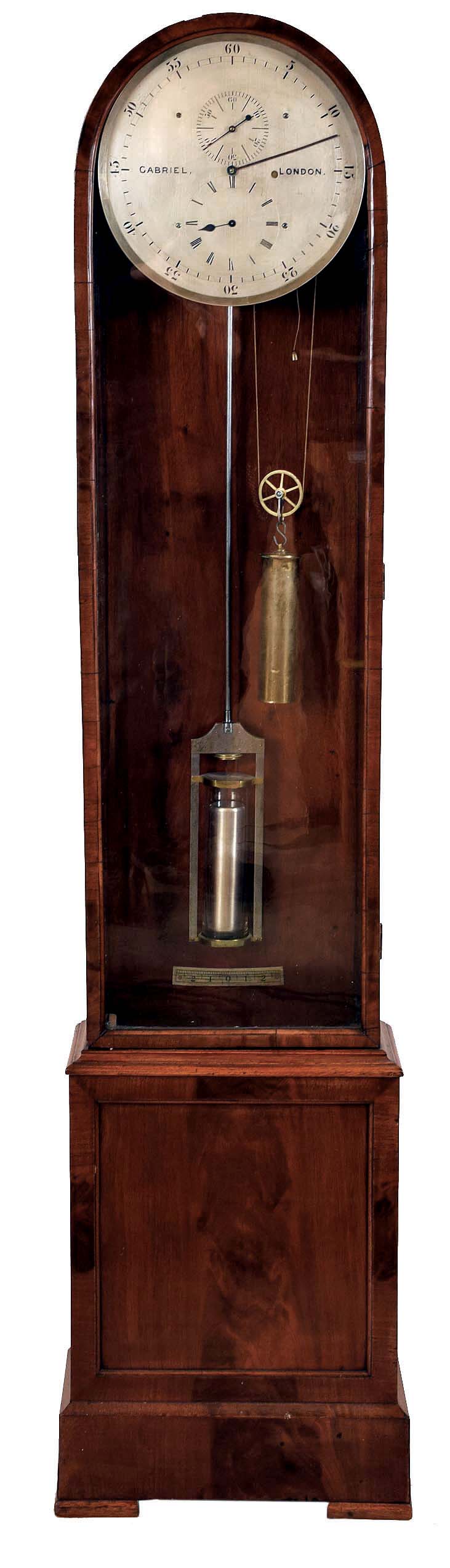 Gabriel, London, astronomical regulator tall clock, 8 days, time only, brass weight driven movement with Graham deadbeat escapement, bolt and shutter type maintaining power in a mahogany veneer case with dome top and silver dial signed by maker. — Antique Clocks Price Guide