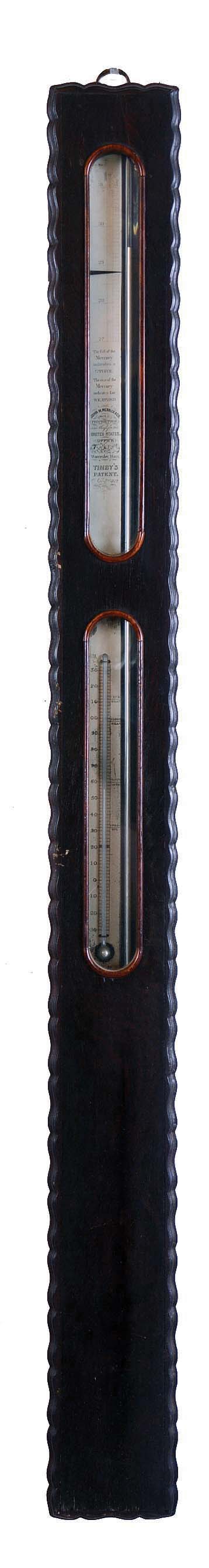 John M. Merrick &amp; Co., 7 Central Exchange, Worcester, Mass., Timby patent stick barometer, rosewood veneered case with ripple molding on sides with silvered barometer scale with set hand, lower glass for thermometer, the back with label "No. 5" and patent information. — Antique Clocks Price Guide