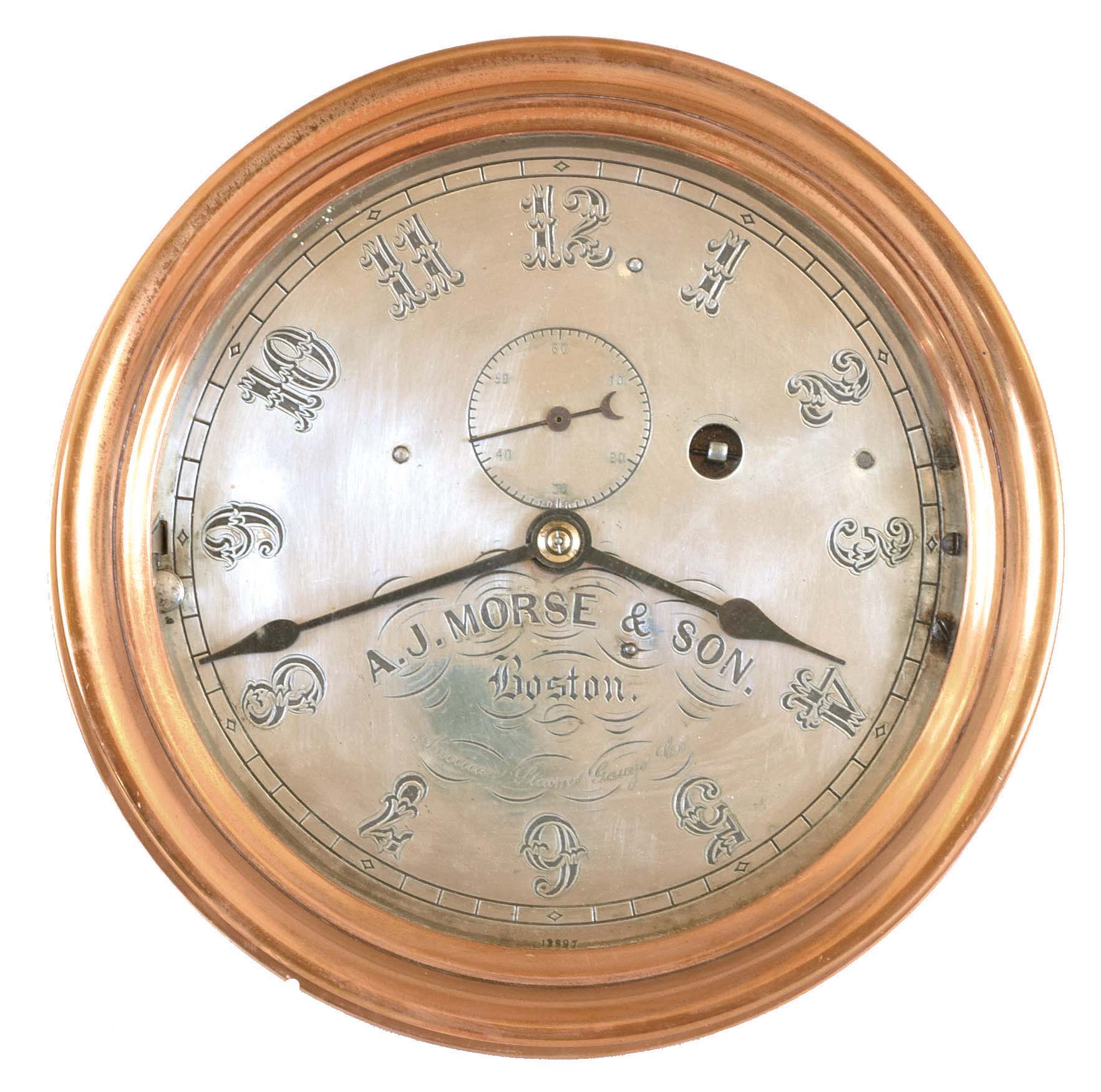 E. Howard &amp; Co., Boston, Mass., for American Steam Gauge Co./ A.J. Morse &amp; Son, Boston, Mass., "No. 69" style marine clock, round bronze case with mounting flange, 8 inch Arabic numeral silvered dial, blued steel spade hands, signed, 8 day brass timepiece with lever platform, scraped, lacquered plates and dust shields, movement #23, dial #12897 — Antique Clocks Price Guide