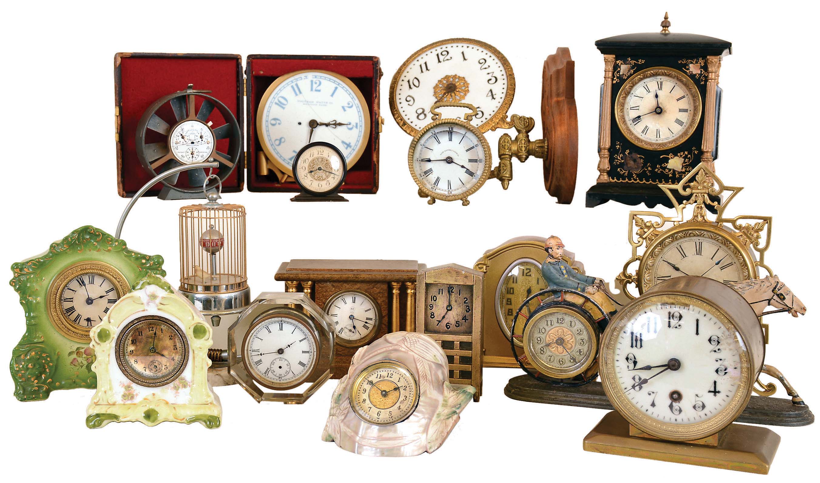 Clocks- 17 (Seventeen) novelty and desk clocks. Includes Waltham and unsigned glass light clocks (one with wall bracket) , Boston Clock Co. brass mantel, 2 small China, Ansonia in seashell, Westclox, New Haven, Welch paperweight, Seth Thomas miniature Adamantine, and Occupied Japan birdcage. Also Tycos air meter. — Antique Clocks Price Guide