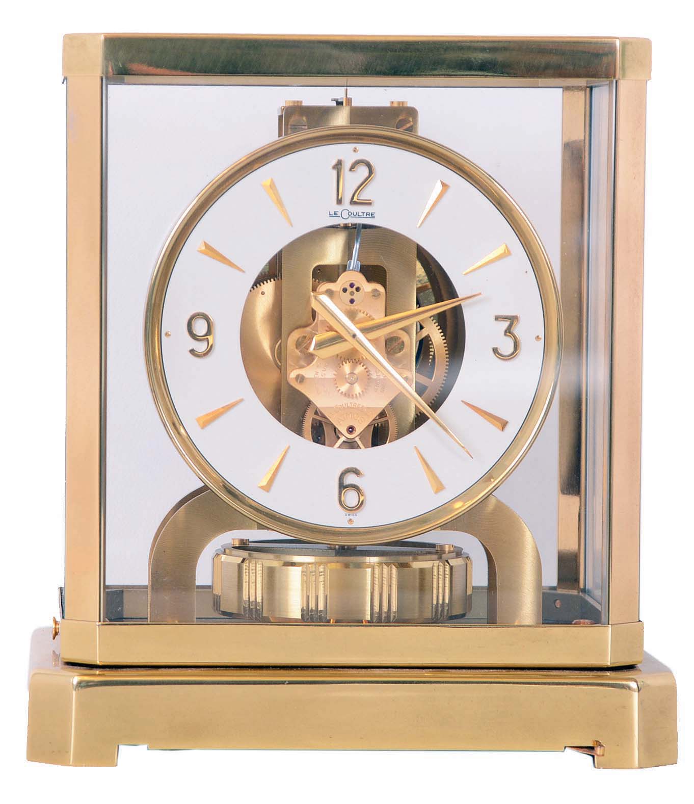 LeCoultre, Switzerland, "Atmos" perpetual gold-plated brass and glass time only mantel clock, serial number 156355 — Antique Clocks Price Guide