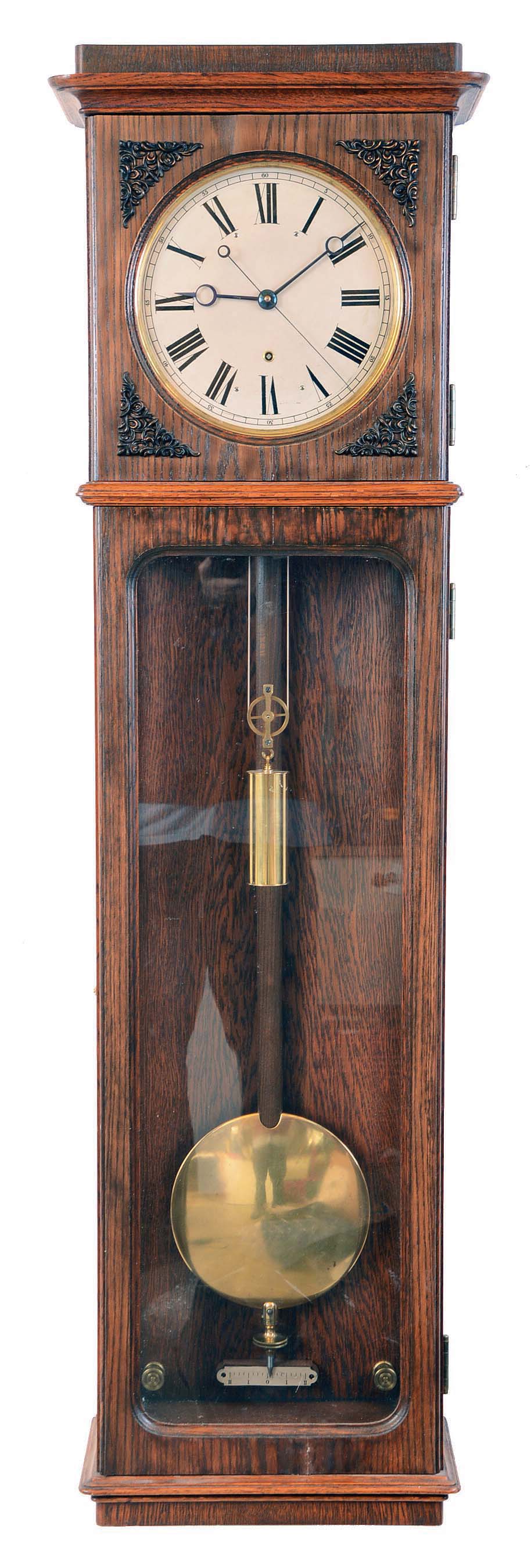 Lenzkirch Clock Co., Germany, jeweler's regulator wall clock, 8 days, time only, weight driven movement with adjustable steel pallets, fine pendulum beat adjustment, center sweep second's hand in an oak case with applied corner spandrels on door surrounding dial and four internally activated knurled nut stabilizers, silvered dial with moon hands, serial no. 1,892,011 — Antique Clocks Price Guide