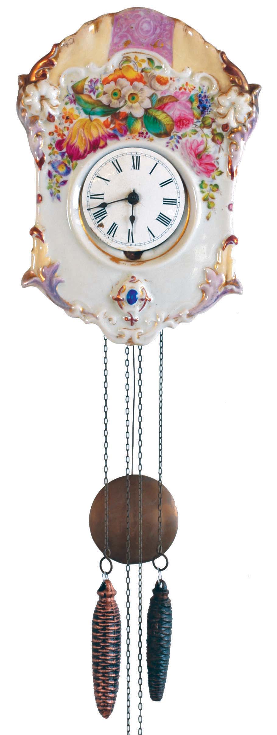 Germany, Black Forest shield clock with porcelain front, well executed floral painting in polychrome overglaze enamel with lustre and gilt accents, Roman numeral white enamel dial, steel spade hands, 30 hour time and strike wood plate movement with brass wheels, brass clad pendulum, pine cone weights — Antique Clocks Price Guide