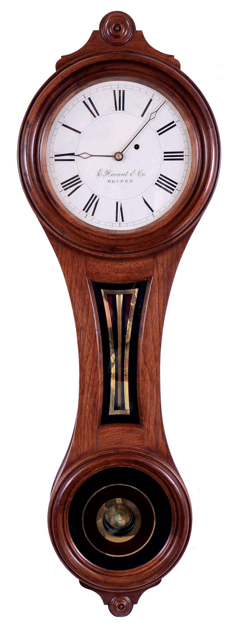 E. Howard &amp; Co., Boston, Mass., "No. 8 Regulator" figure eight, wall clock, 8 days, time only, weight driven movement in a walnut case with a painted metal dial and reverse painted throat and lower tablets. — Antique Clocks Price Guide