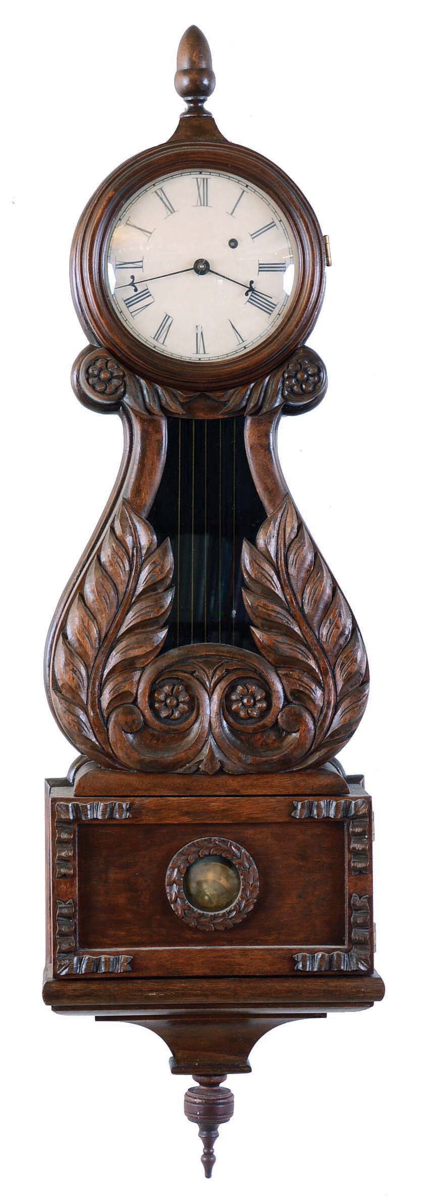 Oliver J. Risinger, Pasadena, Texas, reproduction lyre banjo clock in the style of John Sawin, 8 days, time only, weight driven movement in a carved walnut case with papered metal dial and reverse painted tablet, movement signed "OJR", dated "1992" and numbered "203" — Antique Clocks Price Guide