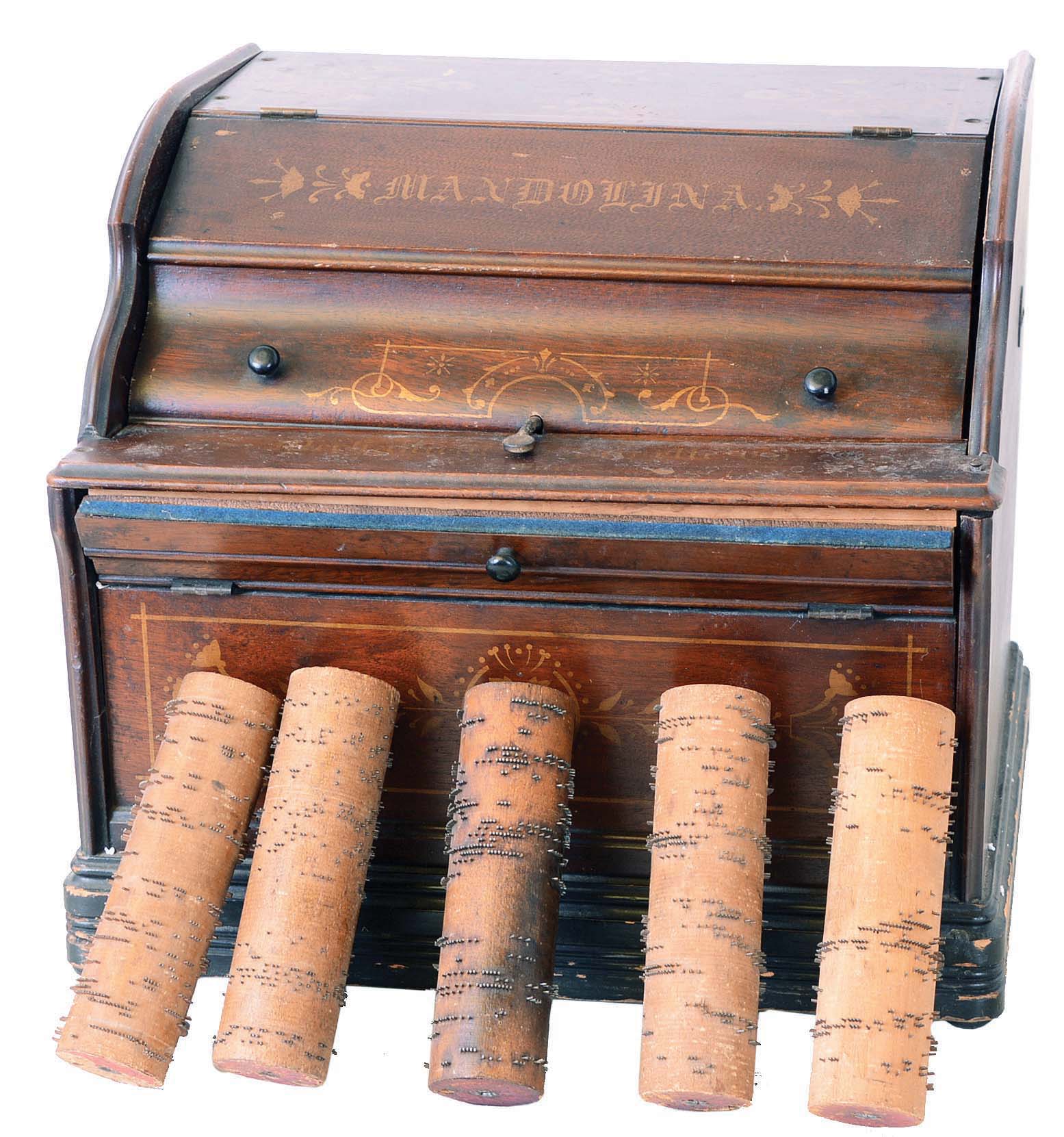 Mechanical music machines- 3 (Three) including a "Mandolina" roller organ by Mechanical Orguinette Co. of New York with 5 cylinders, and two pinned cylinder wood box music boxes; all in pieces. Early 20th century — Antique Clocks Price Guide