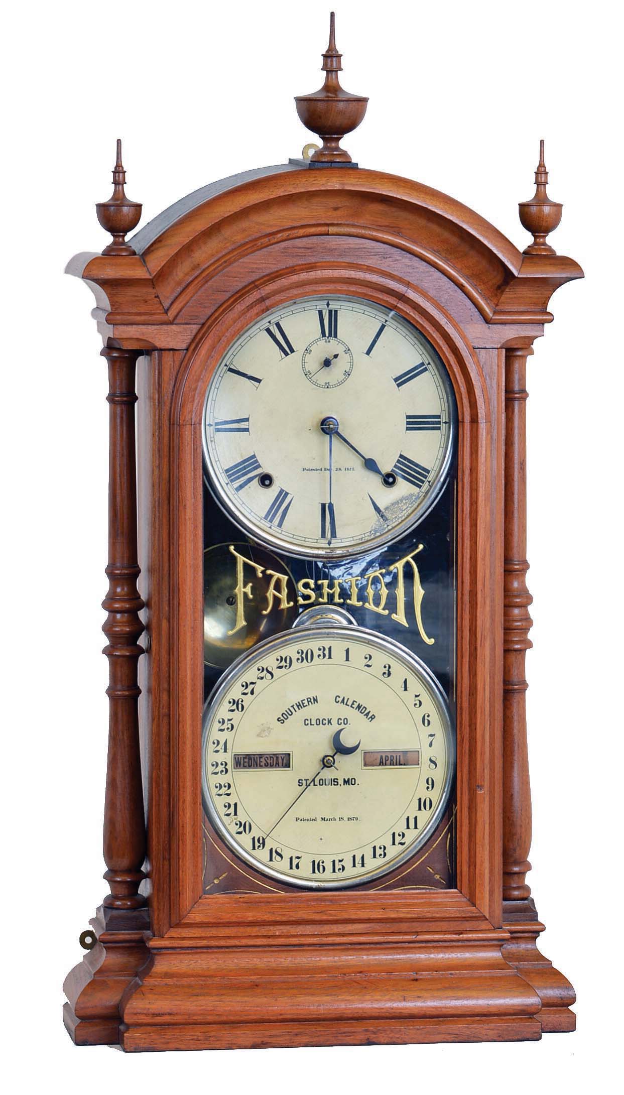 Seth Thomas Clock Co., Thomaston, Conn., "Fashion No. 3", 8 day, time and strike spring driven brass movement (with seconds bit) double dial calendar clock in a walnut case, — Antique Clocks Price Guide
