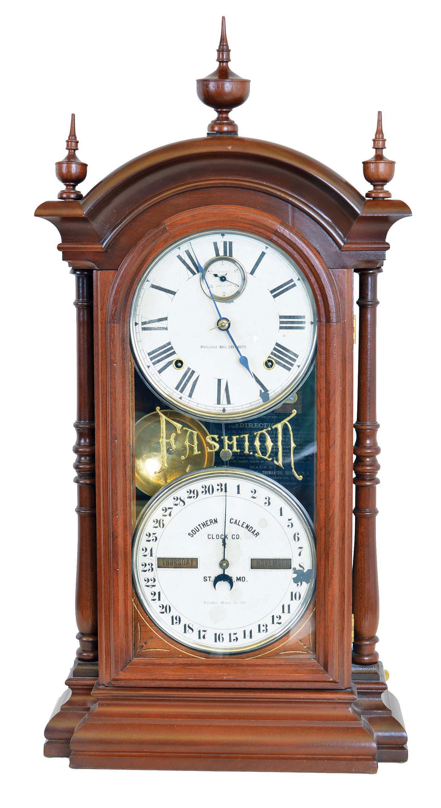 Seth Thomas Clock Co., Thomaston, Conn., "Fashion No. 4", 8 day, time and strike spring driven brass movement (with seconds bit) double dial calendar clock in a walnut case. — Antique Clocks Price Guide