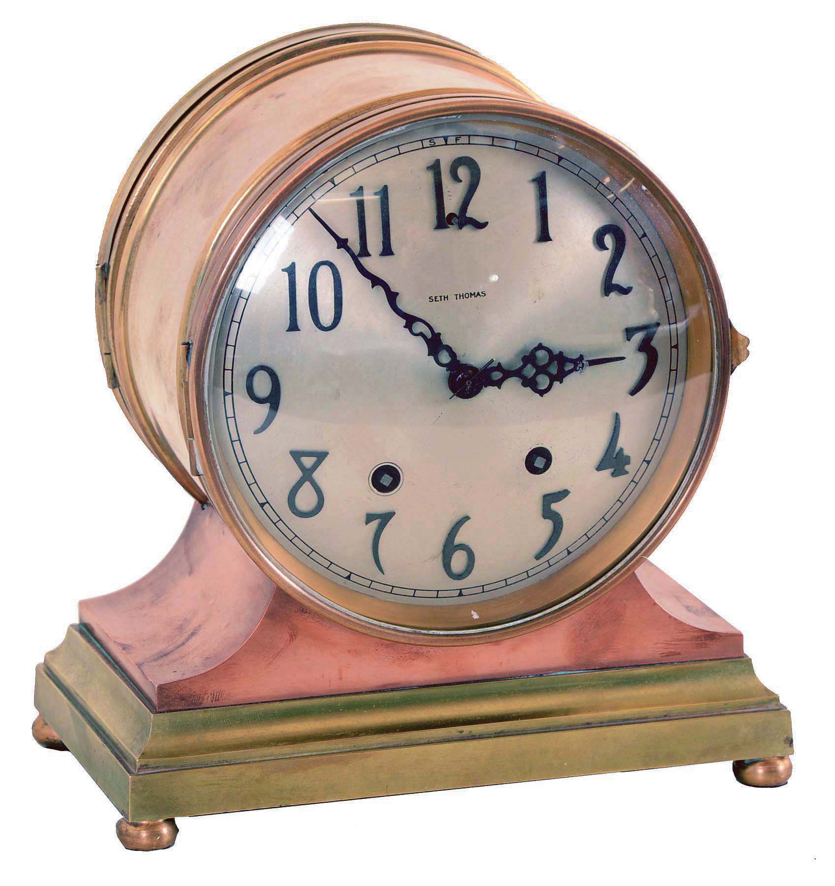 Seth Thomas Clock Co., Thomaston, Conn., "Denton" mantel clock with a spring driven 8 day, time and strike movement in a brass and copper case. — Antique Clocks Price Guide